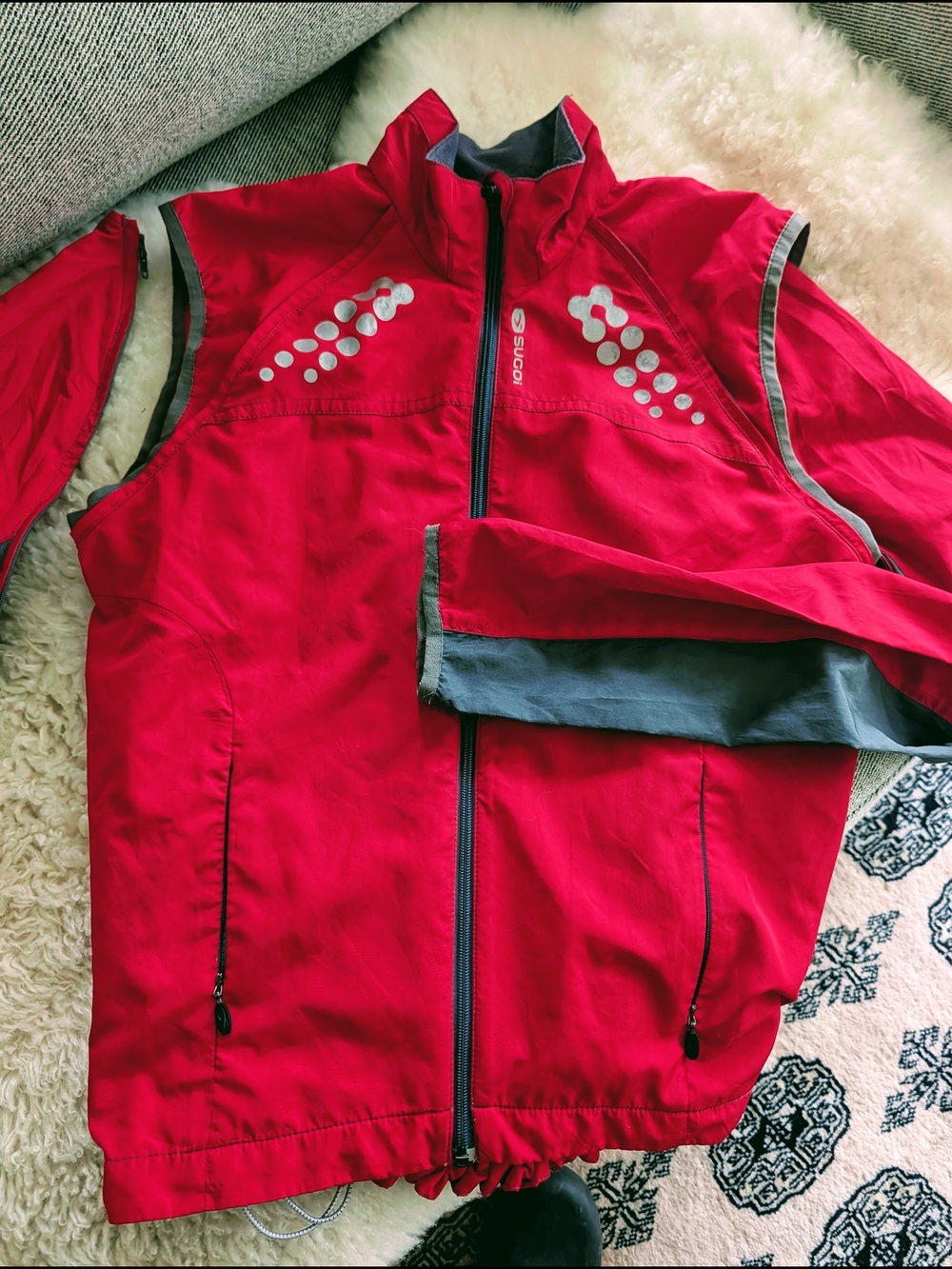 Red SUGOI Reflective cycling/running Jacket/vest with handy zip off sleeves